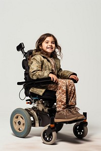 Wheelchair child sitting girl. 