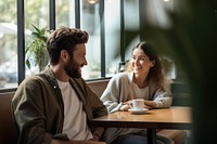 Coffee drinking talking adult. AI generated Image by rawpixel.