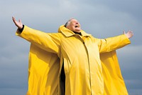Raincoat adult man retirement. AI generated Image by rawpixel.