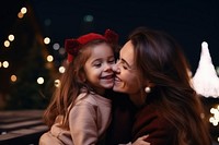 Mother and daughter at Christmas.