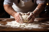 Cooking person flour dough. 