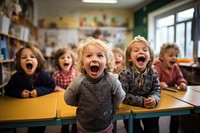 Kindergarten classroom laughing student. 