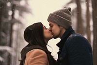 Kissing adult snow affectionate. AI generated Image by rawpixel.