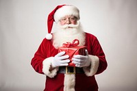 Christmas holding adult gift. AI generated Image by rawpixel.