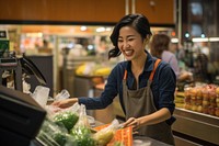 Supermarket groceries smiling adult. 