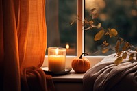 Candle window pumpkin autumn. 