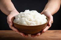 Rice holding white food. 