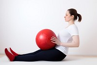 Ball pregnant sitting sports. 