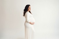 Pregnant portrait standing dress. 