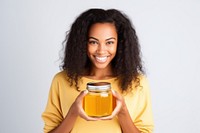 Honey jar portrait holding. AI generated Image by rawpixel.