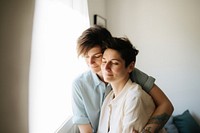 Portrait smiling hugging photo. AI generated Image by rawpixel.