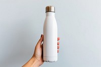 Bottle holding hand milk. AI generated Image by rawpixel.