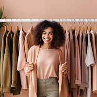 Wardrobe standing boutique smiling. 