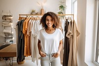 Standing boutique smiling female. 