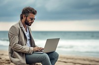 Sitting laptop computer beach. AI generated Image by rawpixel.