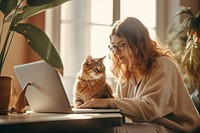 Laptop computer sitting mammal. 