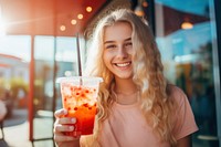 Smile person blonde drink. 