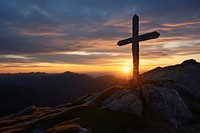 Cross mountain sunlight outdoors. 