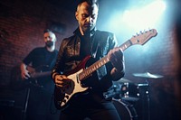 Guitar guitarist musician drums. AI generated Image by rawpixel.