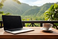 Computer laptop coffee table. AI generated Image by rawpixel.