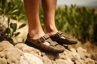 Footwear outdoors sandal person. AI generated Image by rawpixel.