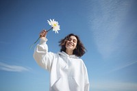 Outdoors flower portrait holding. 