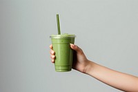 Smoothie milkshake holding juice. AI generated Image by rawpixel.