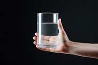 Glass holding adult hand. AI generated Image by rawpixel.