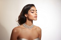 Woman wearing diamond necklace