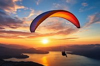 Paragliding recreation adventure sunset. 