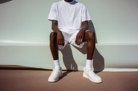 Sitting shorts white architecture. AI generated Image by rawpixel.