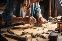 Workbench jewelry making hand. 