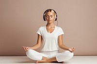 Headphones yoga sitting adult. 