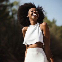 Laughing outdoors smiling female. 