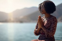 Meditating female prayer adult. 