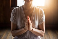 Meditating female adult hand. 