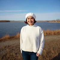 Outdoors portrait sweater sleeve. 