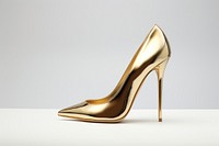 Footwear gold shoe simplicity. AI generated Image by rawpixel.