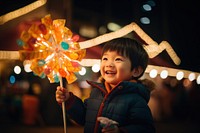 Festival photography portrait toddler. AI generated Image by rawpixel.
