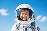 Astronaut smiling helmet child. AI generated Image by rawpixel.