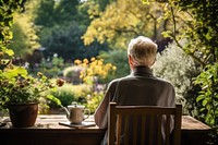 Garden contemplation outdoors sitting. AI generated Image by rawpixel.