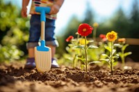 Garden child soil gardening. 