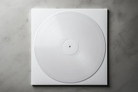 White disk technology turntable. 