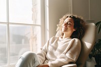 Sitting window adult woman. 