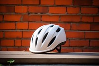Helmet brick wall protection. AI generated Image by rawpixel.