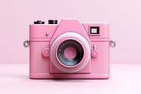 Camera pink photographing electronics. AI generated Image by rawpixel.