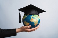 Graduation globe holding planet. AI generated Image by rawpixel.