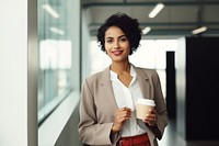 Cup portrait holding blazer. 