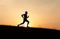 Backlighting silhouette running jogging. 