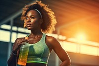 Woman holding water bottle. 